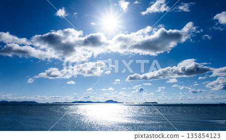 Early morning view of the Ieshima Islands and the sun from Ako Misaki in Ako City, Hyogo Prefecture Early morning view of the Ieshima Islands and the sun from Ako Misaki in Ako City, Hyogo Prefecture 135854123