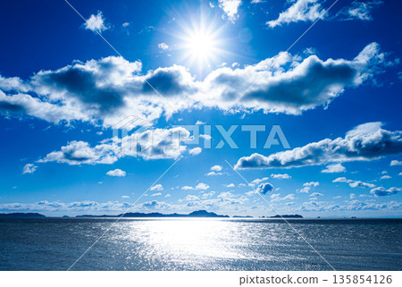 Early morning view of the Ieshima Islands and the sun from Ako Misaki in Ako City, Hyogo Prefecture Early morning view of the Ieshima Islands and the sun from Ako Misaki in Ako City, Hyogo Prefecture 135854126