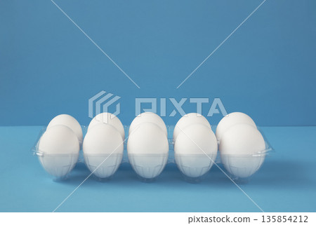 Eggs on a blue background 135854212
