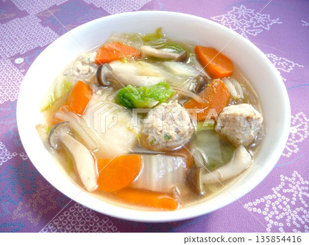 Chicken dumpling soup with rice cakes 135854416