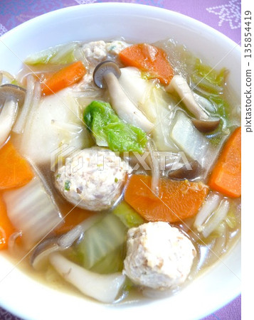 Chicken dumpling soup with rice cakes Chicken dumpling soup with rice cakes 135854419