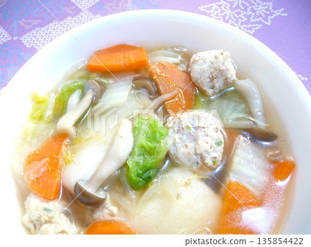 Chicken dumpling soup with rice cakes 135854422