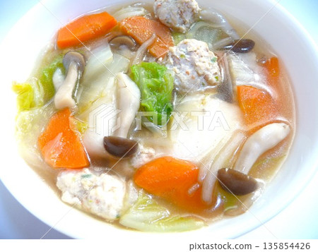 Chicken dumpling soup with rice cakes Chicken dumpling soup with rice cakes 135854426