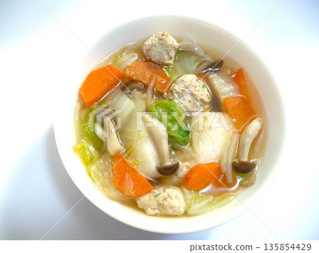 Chicken dumpling soup with rice cakes Chicken dumpling soup with rice cakes 135854429