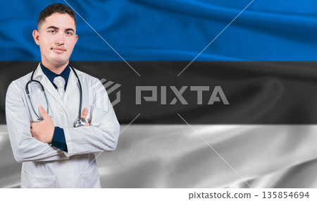 Portrait of medical professional on Estonia flag background. Estonian national health system Portrait of medical professional on Estonia flag background. Estonian national health system 135854694
