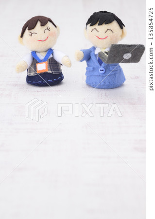 Businessman and office lady dolls Businessman and office lady dolls 135854725