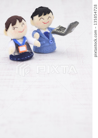 Businessman and office lady dolls Businessman and office lady dolls 135854728