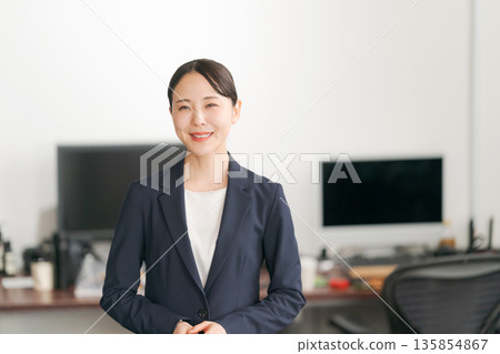 Young business woman with a smile 135854867