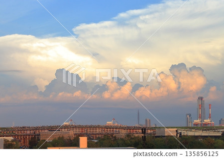 Cumulonimbus clouds, industrial areas, and large roof rings Cumulonimbus clouds, industrial areas, and large roof rings 135856125