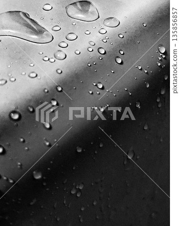 Monochrome photo of water droplets on stainless steel / A cool, inorganic texture image 135856857