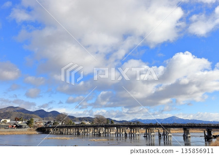 Winter sky and river overlooking Togetsukyo Bridge in Arashiyama 135856911