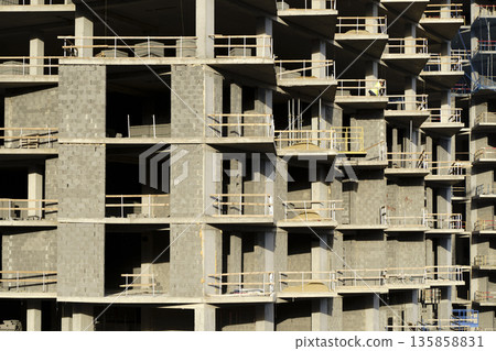 Residential Building Under Construction with Concrete Block Walls. High quality photo Residential Building Under Construction with Concrete Block Walls. High quality photo 135858831