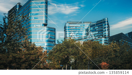 Modern Office Buildings with Curved and Contemporary Facade Architecture Urban Skyline 135859114