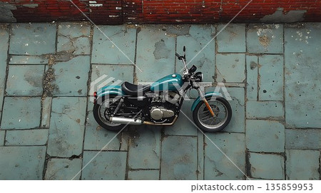 Turquoise Motorcycle Parked Against Weathered Blue Stone and Red 135859953