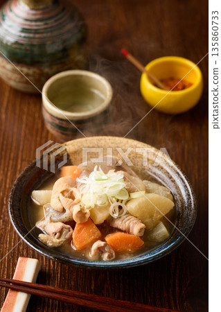 Stewed offal served on a plate 135860733