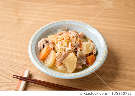 Stewed offal served on a plate 135860752