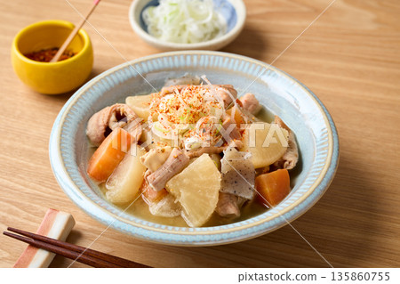 Stewed offal served on a plate 135860755