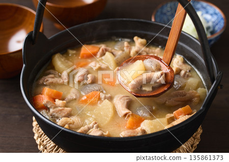 Stewed offal cooked in an iron pot Stewed offal cooked in an iron pot 135861373
