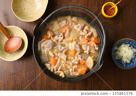 Stewed offal cooked in an iron pot Stewed offal cooked in an iron pot 135861376