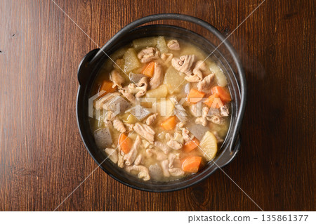 Stewed offal cooked in an iron pot 135861377
