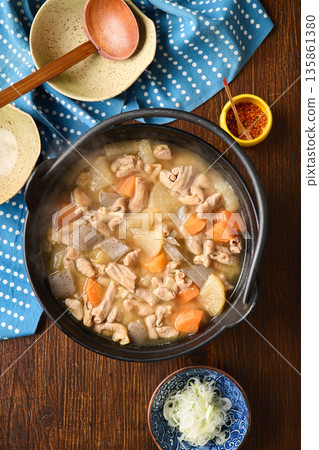 Stewed offal cooked in an iron pot Stewed offal cooked in an iron pot 135861380