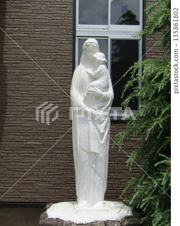 A statue of Mary standing in front of the Catholic Kigazu Church in Kigazu-cho, Hirado City, Nagasaki Prefecture 135861802