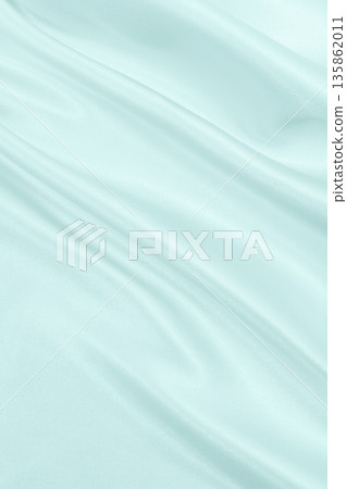 Smooth elegant blue silk or satin luxury cloth texture as abstract background. Luxurious background design 135862011