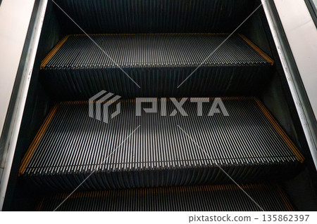 Shopping mall, escalator, moving escalator, escalator Shopping mall, escalator, moving escalator, escalator 135862397