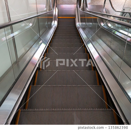 Shopping mall, escalator, moving escalator, escalator Shopping mall, escalator, moving escalator, escalator 135862398