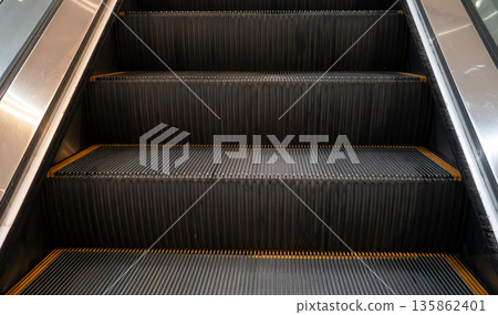 Shopping mall, escalator, moving escalator, escalator Shopping mall, escalator, moving escalator, escalator 135862401