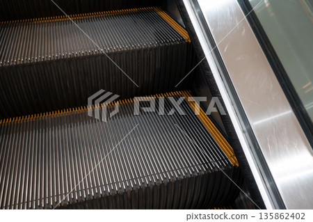 Shopping mall, escalator, moving escalator, escalator 135862402