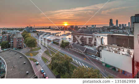 Aerial panoramic view over Maashaven timelapse at sunset in Rotterdam. Aerial panoramic view over Maashaven timelapse at sunset in Rotterdam. 135862999