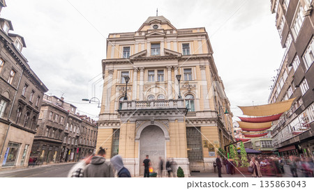 The Eternal flame in the street Ferhadija timelapse hyperlapse is a memorial to the military and civilian victims of the Second World War. 135863043
