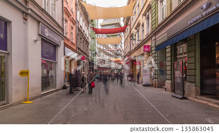Walk on Ferhadija pedestrian street crowded with people timelapse hyperlapse Walk on Ferhadija pedestrian street crowded with people timelapse hyperlapse 135863045