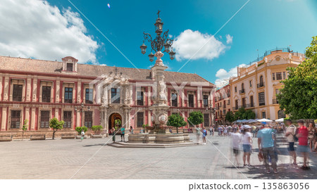 Archbishop Palace of Seville and Fuente Farola Fountain on Plaza de Virgen de los Reyes timelapse 135863056