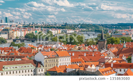 Panorama of Prague Old Town with red roofs timelapse, famous bridges and Vltava river, Czech Republic. 135863080