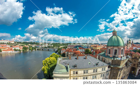 Panoramic view of the manes bridge with a building of the czech parliament behind it timelapse from Old Town Bridge Tower. Panoramic view of the manes bridge with a building of the czech parliament behind it timelapse from Old Town Bridge Tower. 135863084