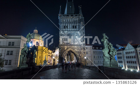 Magnificent Gothic structure called Stare Mesto Tower timelapse hyperlapse on Charles Bridge Magnificent Gothic structure called Stare Mesto Tower timelapse hyperlapse on Charles Bridge 135863126