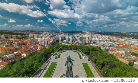 Panoramic view of Prague timelapse from the top of the Vitkov Memorial, Czech Republic Panoramic view of Prague timelapse from the top of the Vitkov Memorial, Czech Republic 135863139