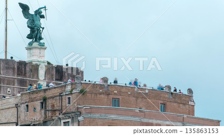 Saint Angel castle timelapse and observation deck on it, located near the Tiber river in Rome, Italy. Saint Angel castle timelapse and observation deck on it, located near the Tiber river in Rome, Italy. 135863153