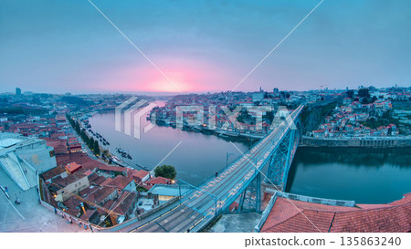 Day to night view of the historic city of Porto, Portugal timelapse with the Dom Luiz bridge Day to night view of the historic city of Porto, Portugal timelapse with the Dom Luiz bridge 135863240