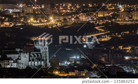 Rooftops of Porto's old town aerial night timelapse, Porto, Portugal 135863252