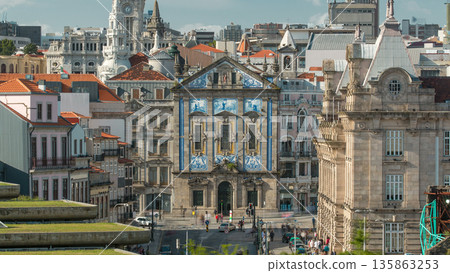 View of the Almeida Garret Square with the Sao Bento railway station and Congregados Church at the back timelapse. 135863253
