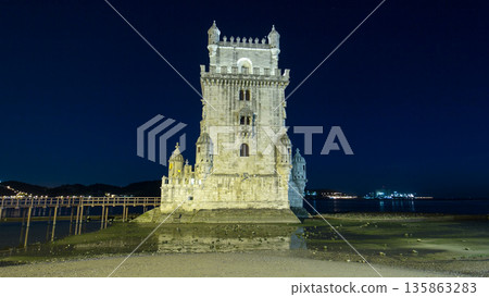Belem Tower on Tagus River night timelapse hyperlapse. Lisbon, Portugal. 135863283