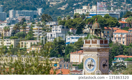 Bright sun lights red roofs of the old city timelapse. Aerial view from Shatto's hill. Nice, France 135863320