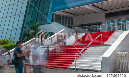 Red carpet stairway at Palais des Festivals et des Congres timelapse in Cannes, France. Red carpet stairway at Palais des Festivals et des Congres timelapse in Cannes, France. 135863330