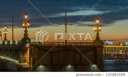 Opening Trinity bridge timelapse and pleasure boats are on Neva river in Saint-Petersburg, Russia. Opening Trinity bridge timelapse and pleasure boats are on Neva river in Saint-Petersburg, Russia. 135863389