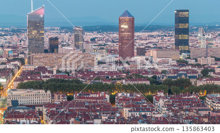 Panoramic aerial view of Lyon after sunset from Fourviere Hill day to night transition. France Panoramic aerial view of Lyon after sunset from Fourviere Hill day to night transition. France 135863403
