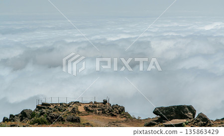 View over the clouds from slopes of Pico do Arieiro, Madeira timelapse 135863429