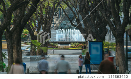 Streets of Funchal town on Madeira, fountain with globe on the background timelapse Streets of Funchal town on Madeira, fountain with globe on the background timelapse 135863430